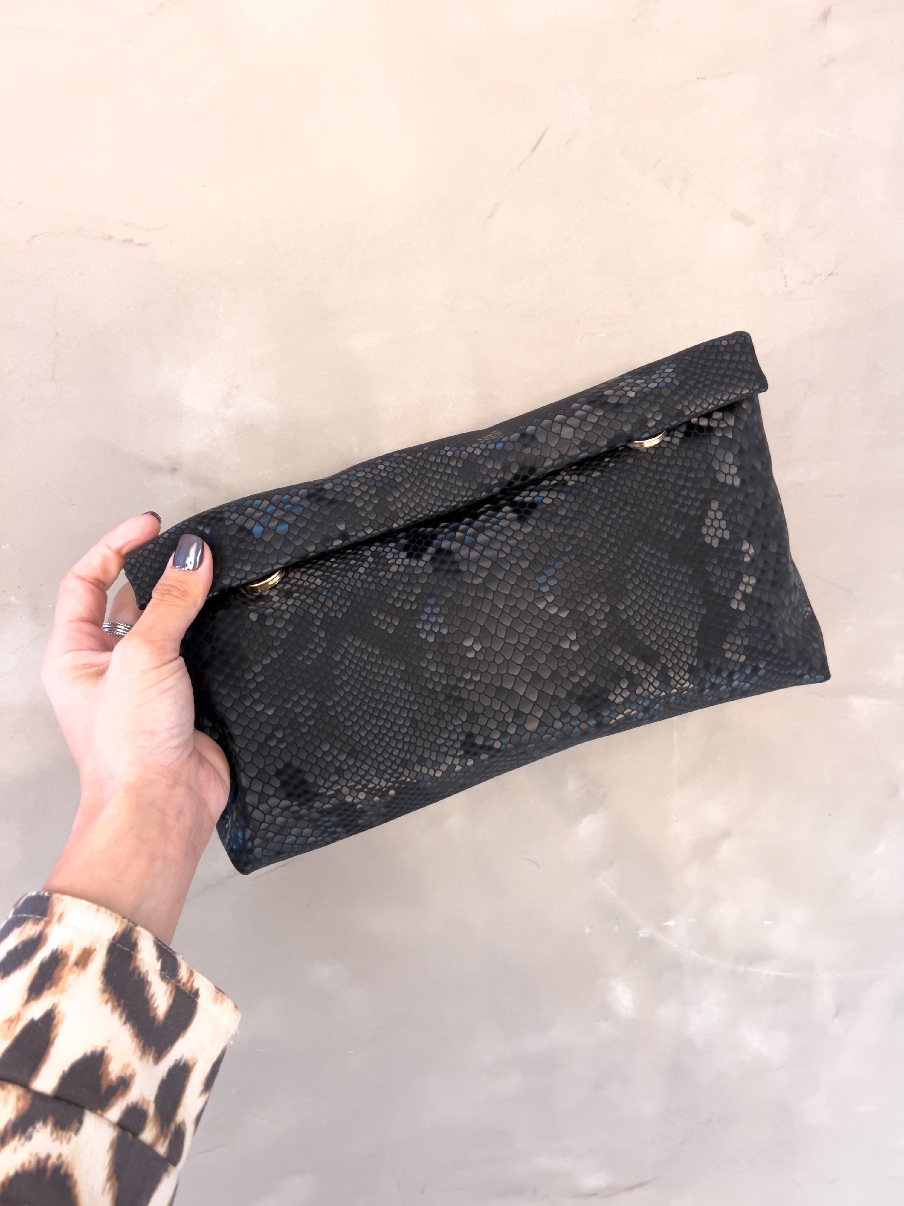 INDIRA SNAKE PRINT CLUTCH