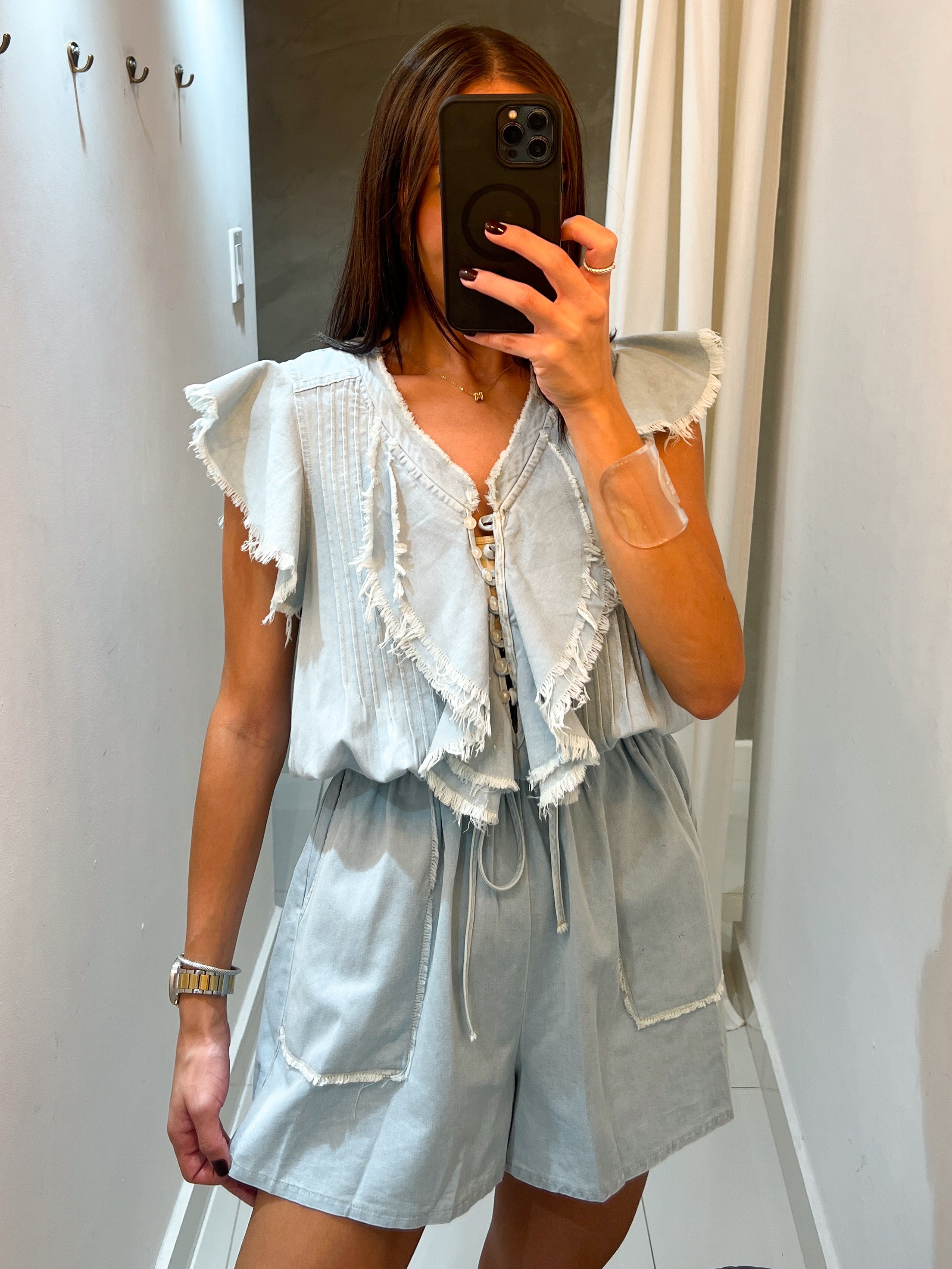 QUINN RUFFLE NECKLINE LIGHT DENIM ROMPER
