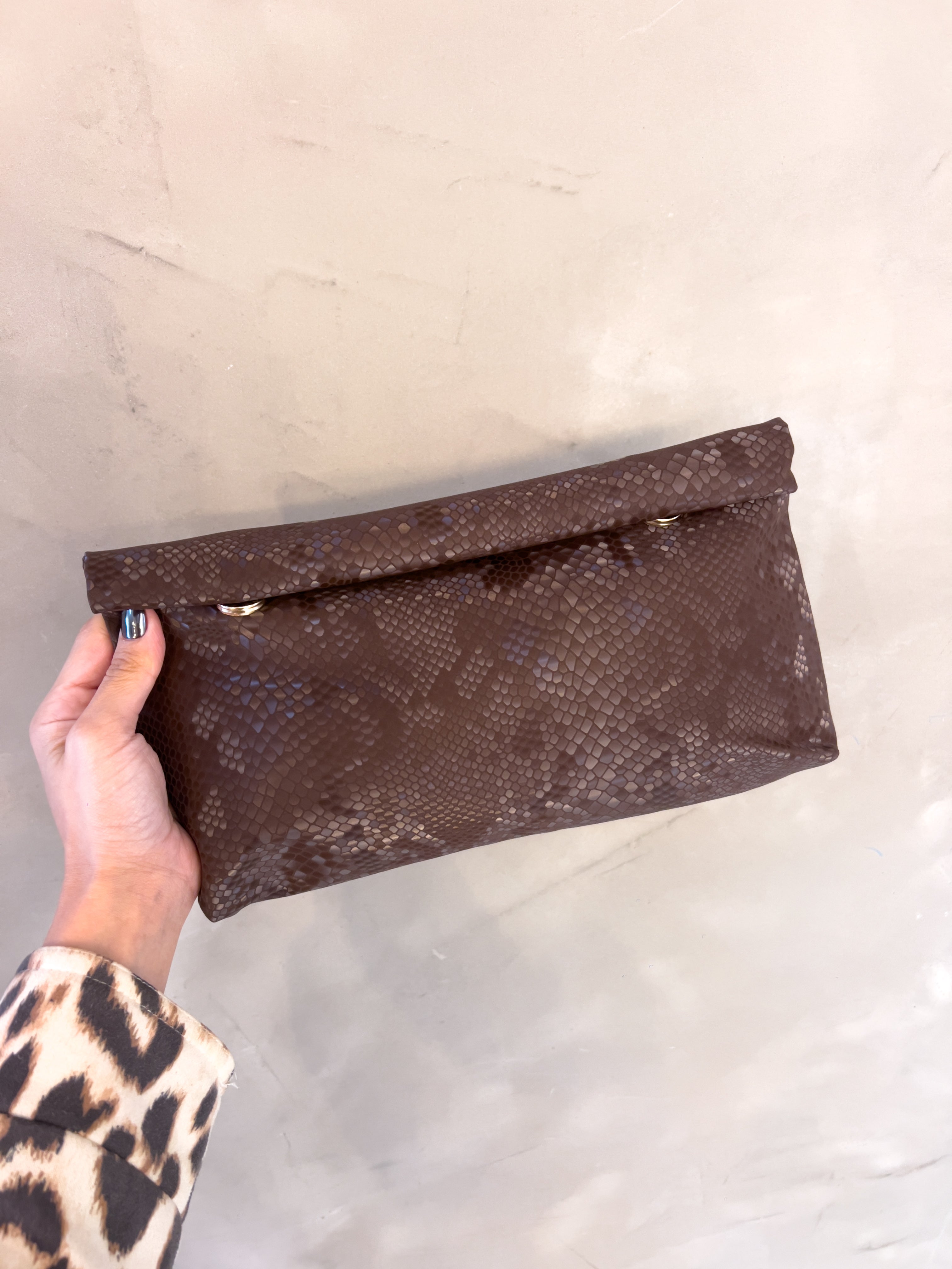 INDIRA SNAKE PRINT CLUTCH