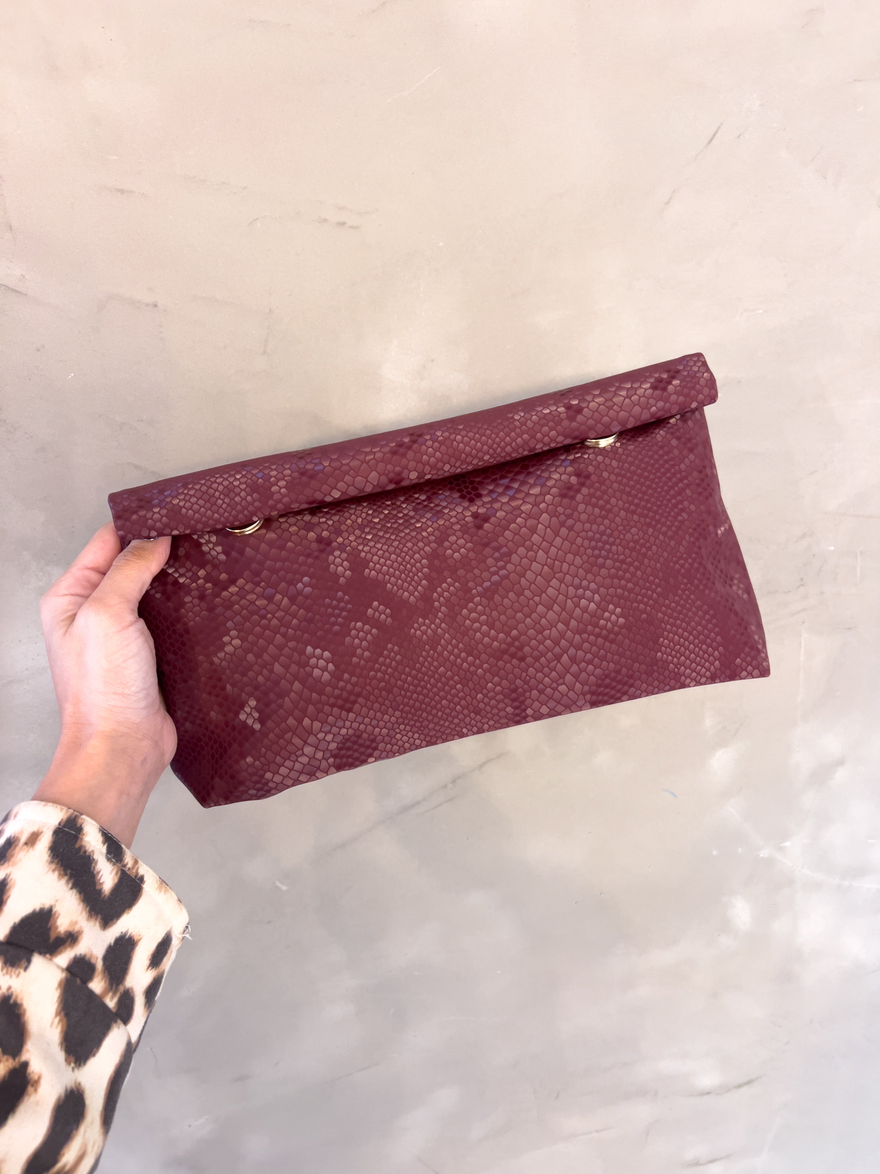 INDIRA SNAKE PRINT CLUTCH