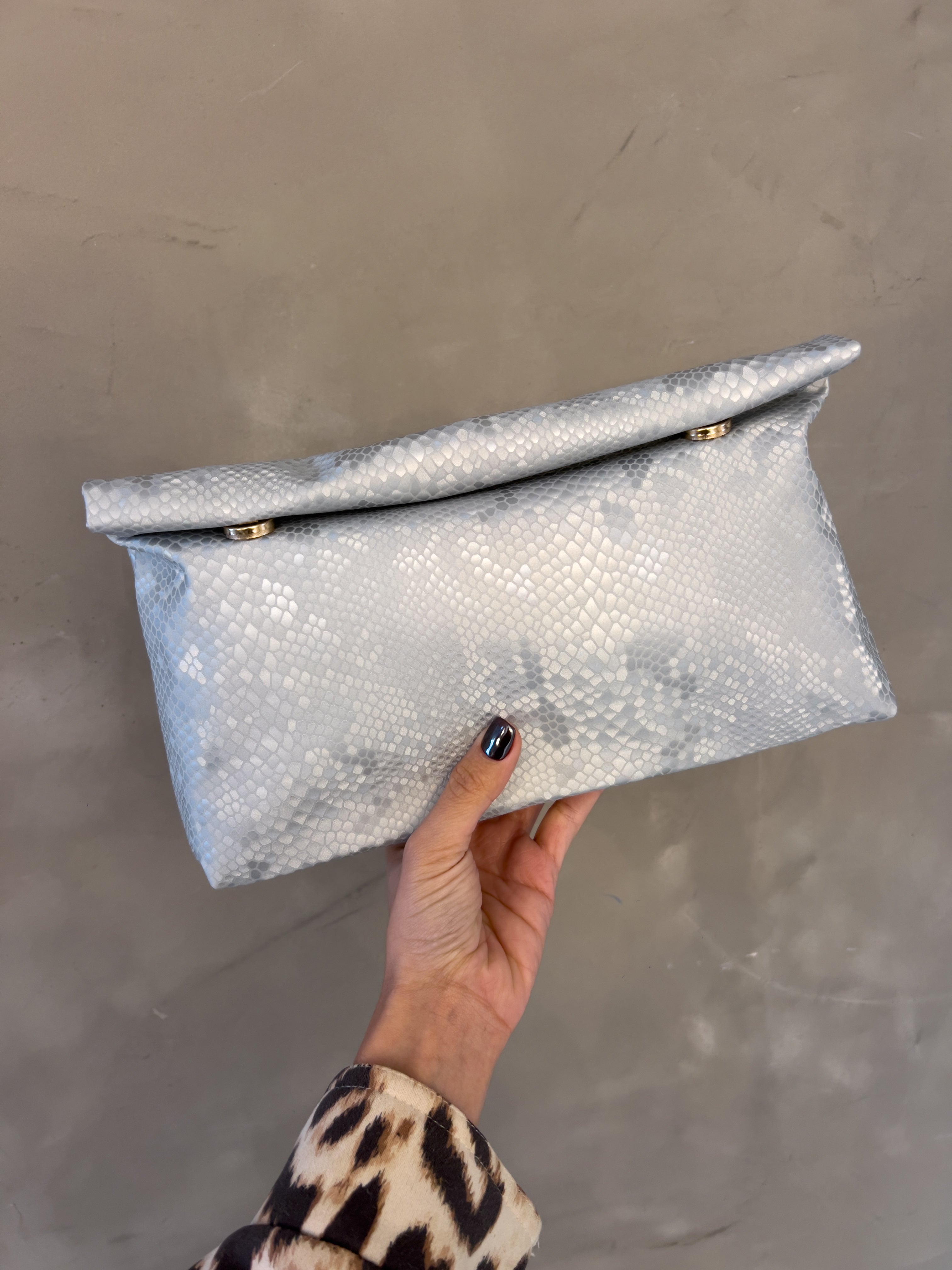 INDIRA SNAKE PRINT CLUTCH