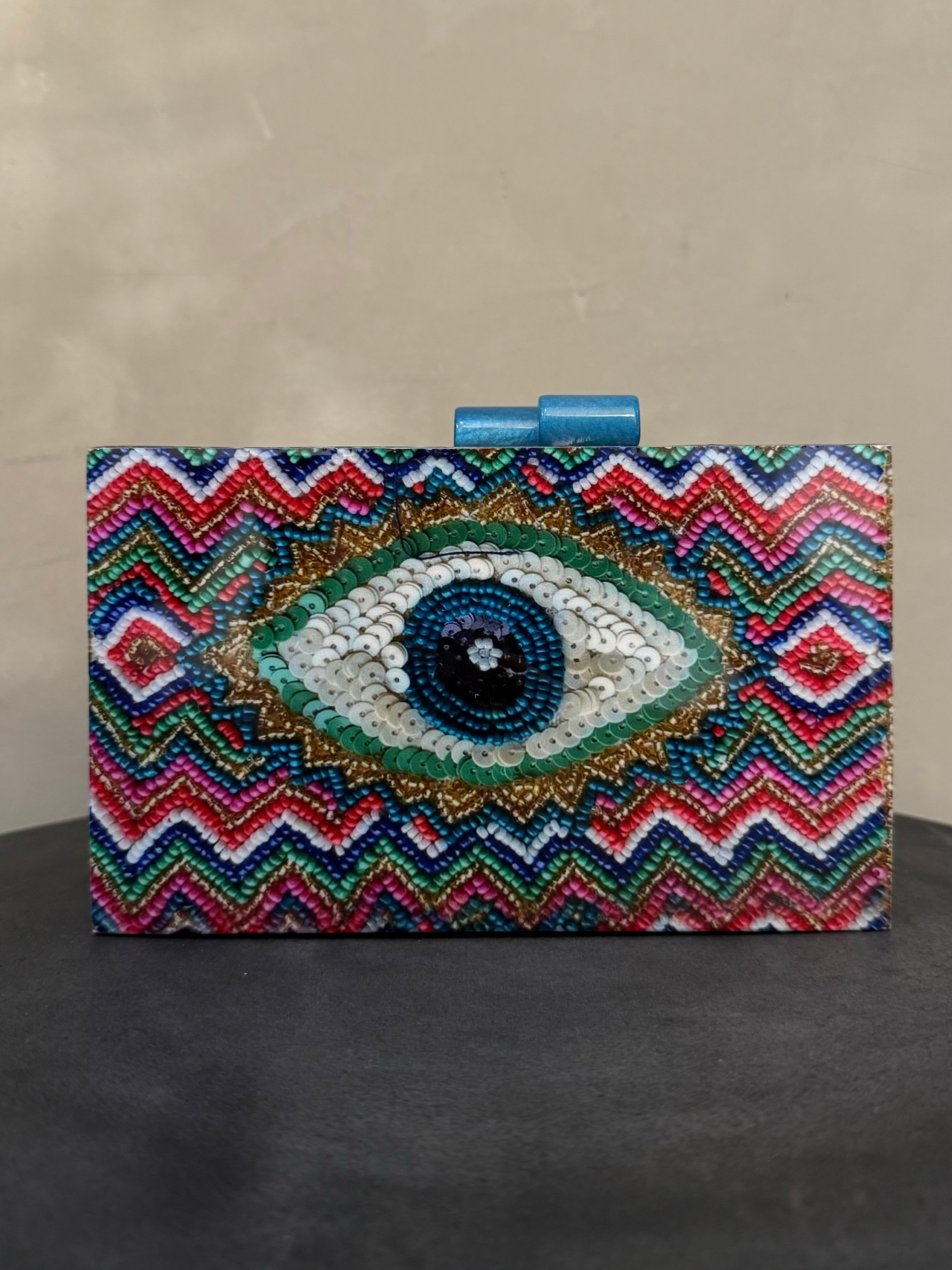 PENELOPE EYE MULTI ACRYLIC CLUTCH